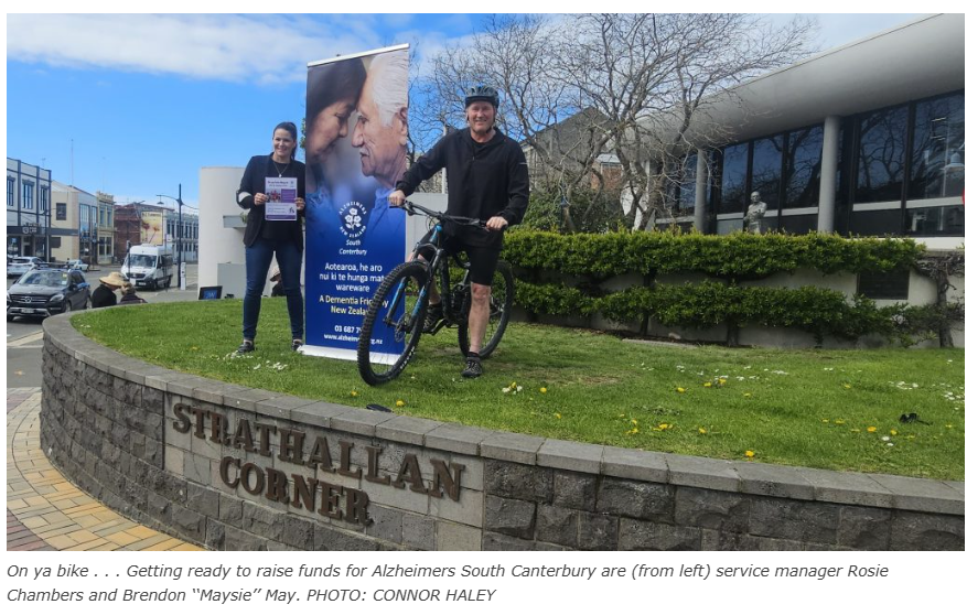 Rosie Chambers & Brendon May with bike