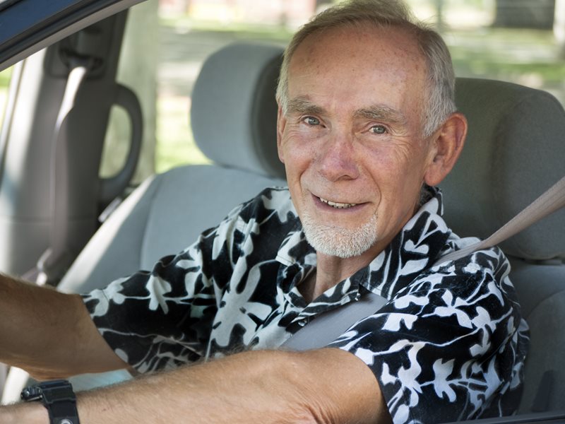 A man driving a car