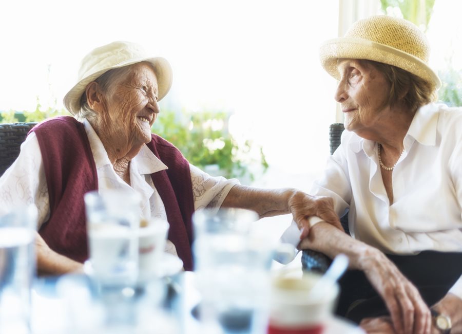 Two women smiling together