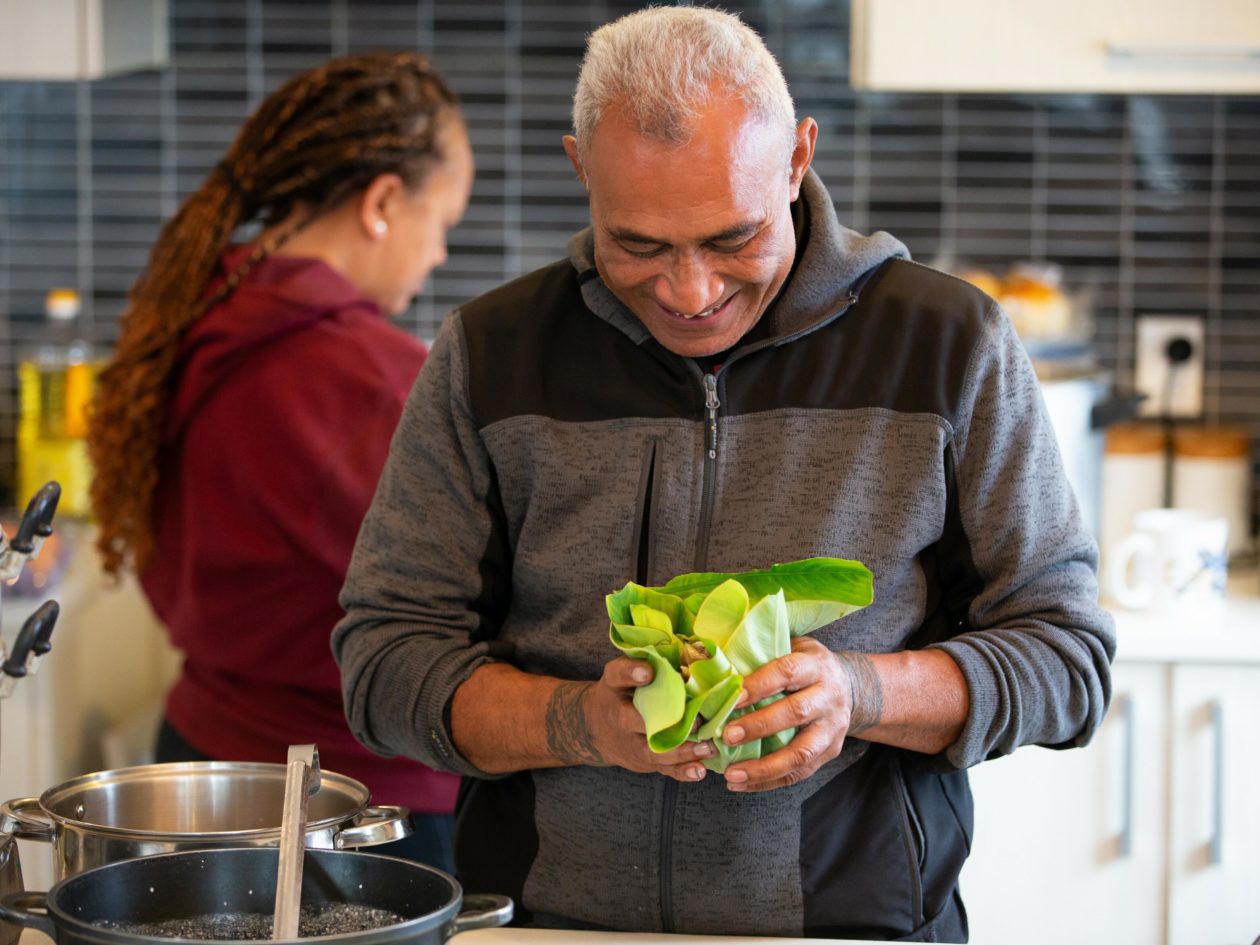 Man preparing vegetables in the kitchen